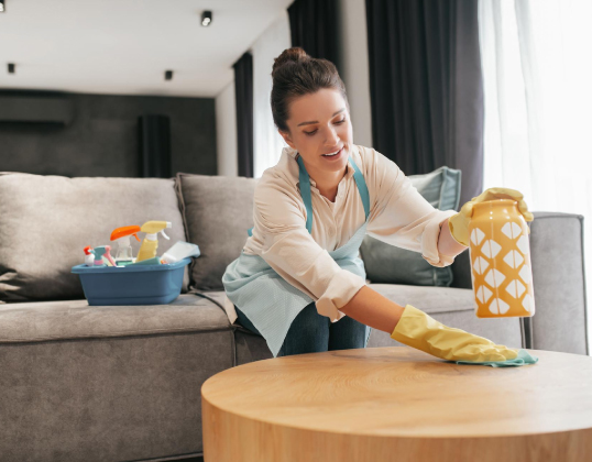 Support worker helping with cleaning and household tasks