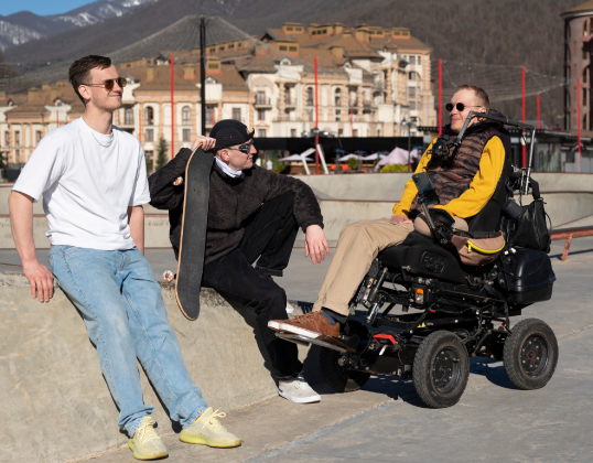 Participant trialling a mobility scooter with their support worker